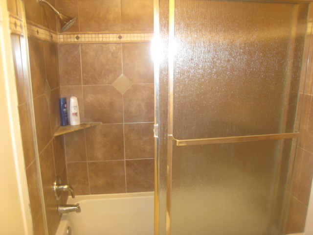 upstairs tiled shower