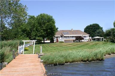 Gentle Lawn Sloping to Private Pier