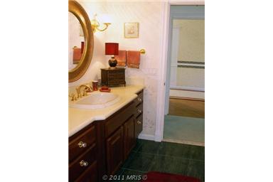 Attractively Appointed and Marble Floored Baths