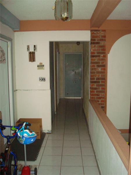 FRONT ENTRANCE WALKING TO BEDROOM AREA