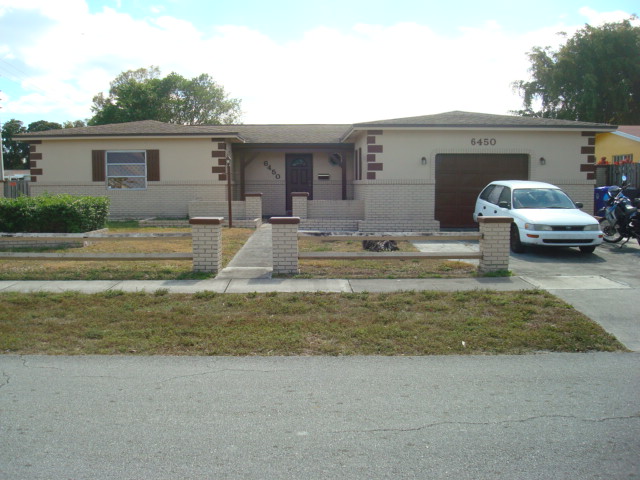 FRONT OF 6450 SW 10 ST