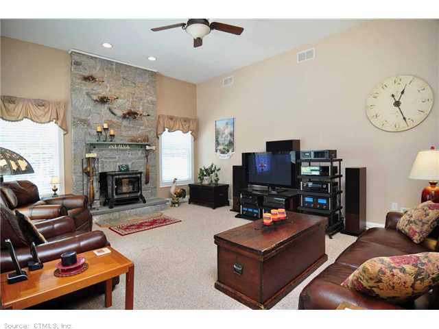 Family Room with Floor to Ceiling Fireplace