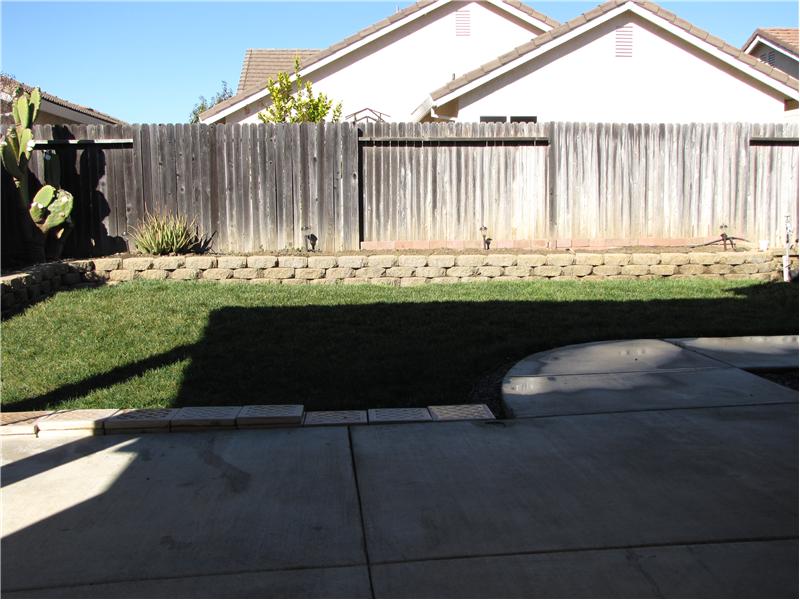 covered patio for BBQs and relaxing