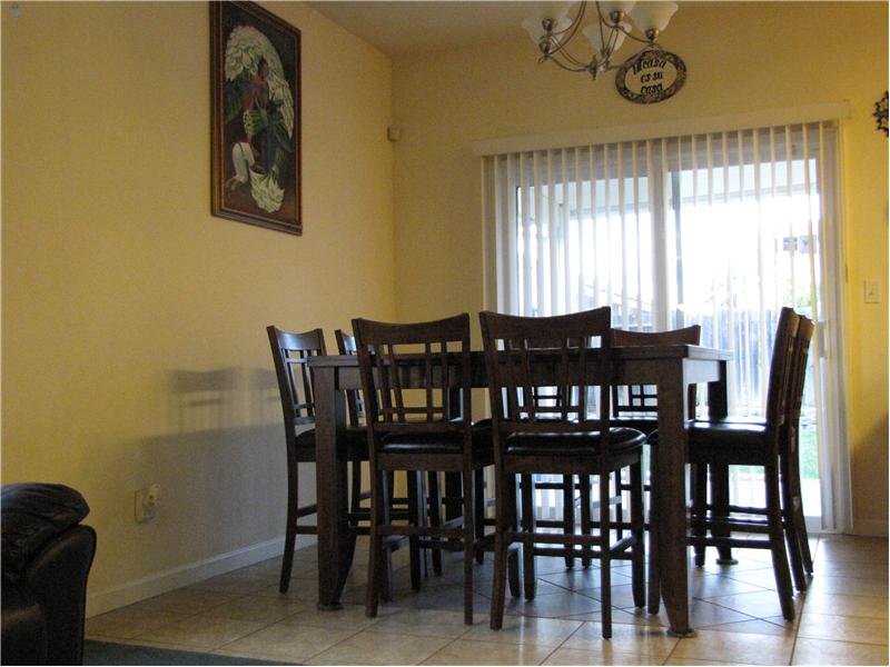 dining area with sliding door to patio