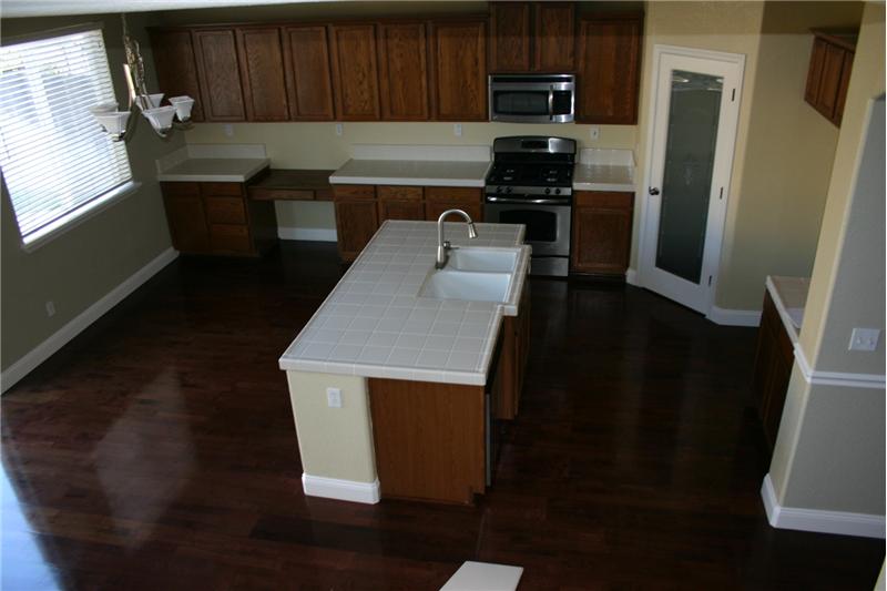 View from stairwell looking down onto kitchen