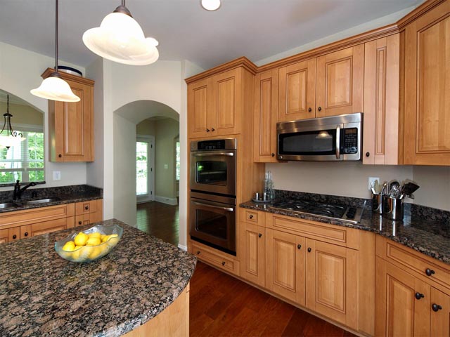 Stainless appliances including double ovens and gas cooktop