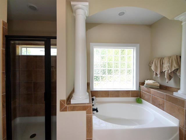 Tile shower and soaking tub in master bath