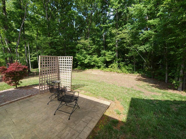 One of two stamped concrete patios in back