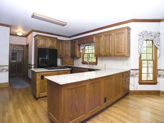 Custom-built cabinetry plus granite countertops