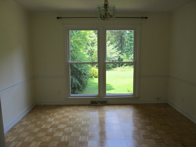 Formal dining room overlooks backyard