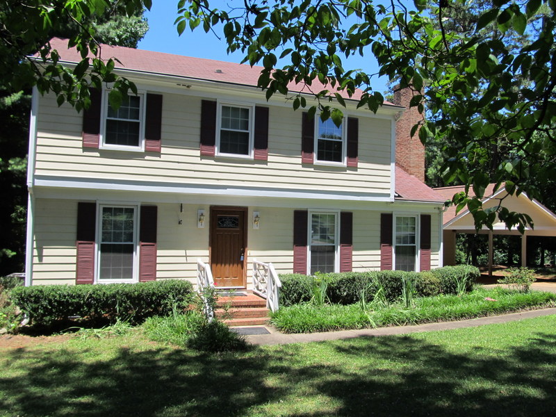 Affordable four bedroom home with carport