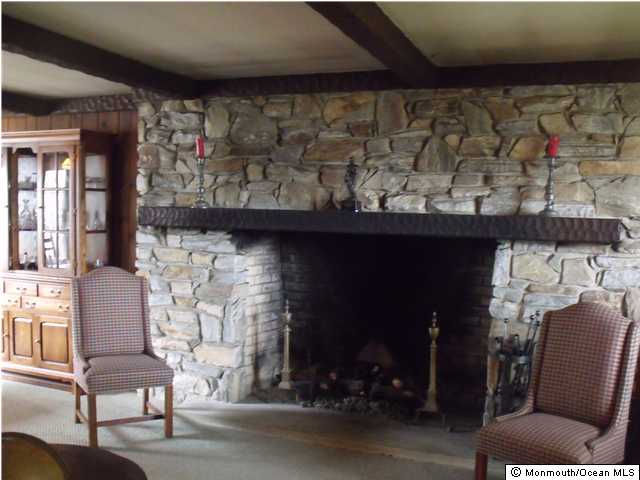 Large family room with gas fireplace.