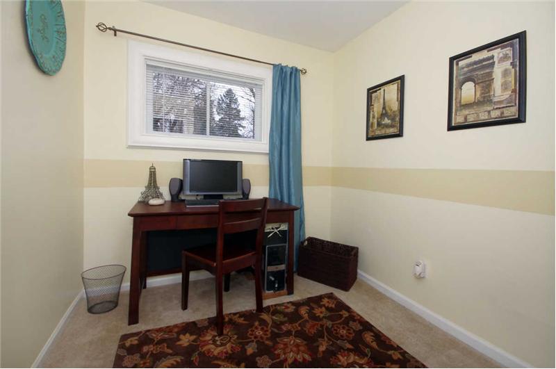 Main level bedroom currently being used as an office
