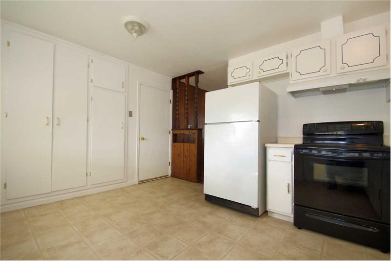 Custom kitchen pantry with rollout shelving