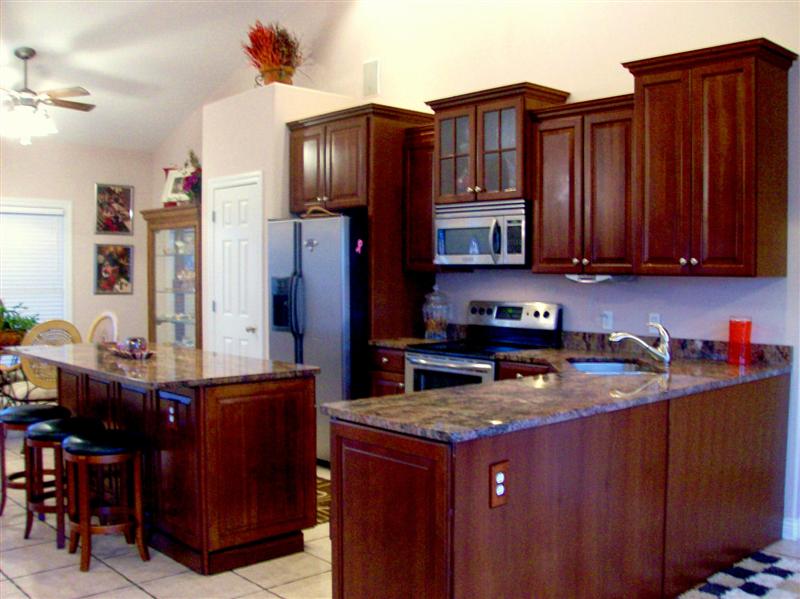 Spacious Kitchen with Granite Counter Tops and SS Appliances