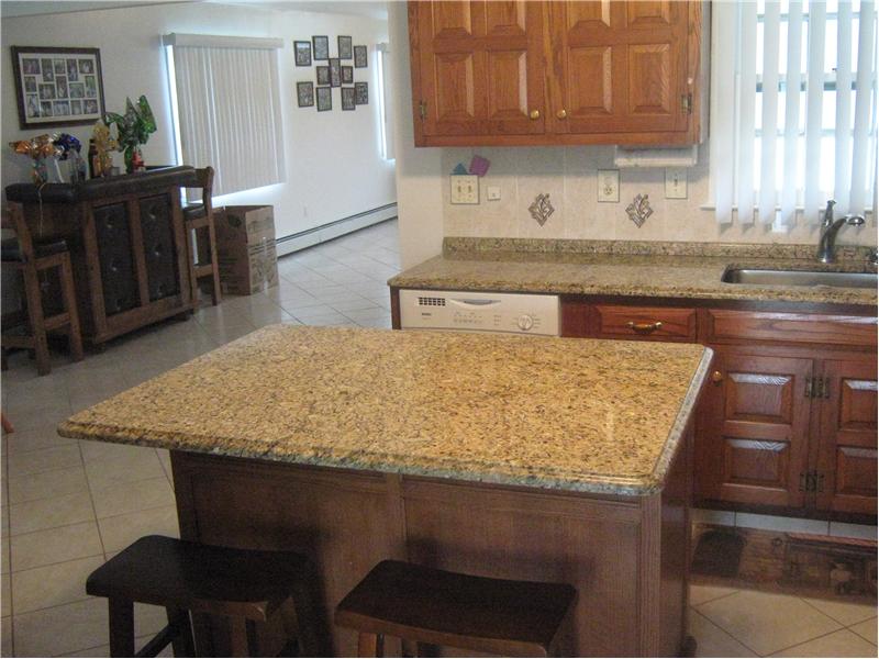 Kitchen with granite tops