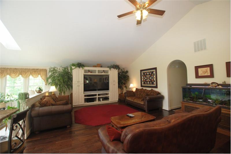 Hand planed oak floors and vaulted ceiling