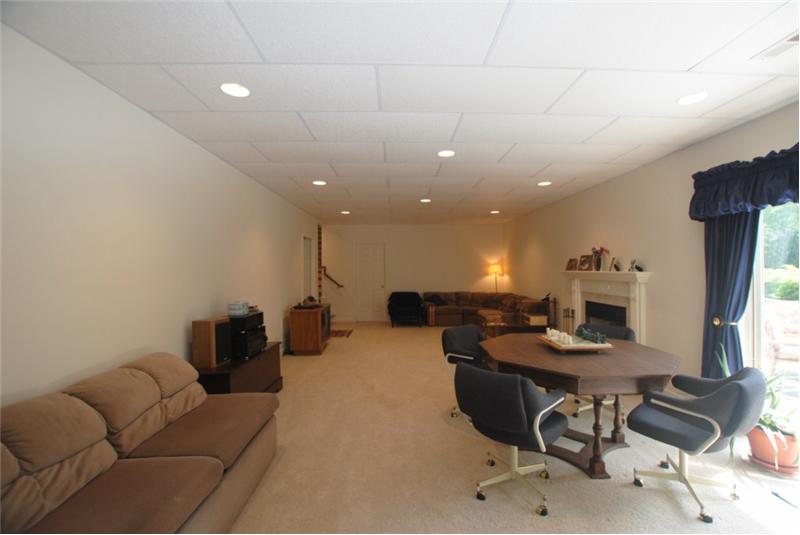 Family room with wood burning fireplace