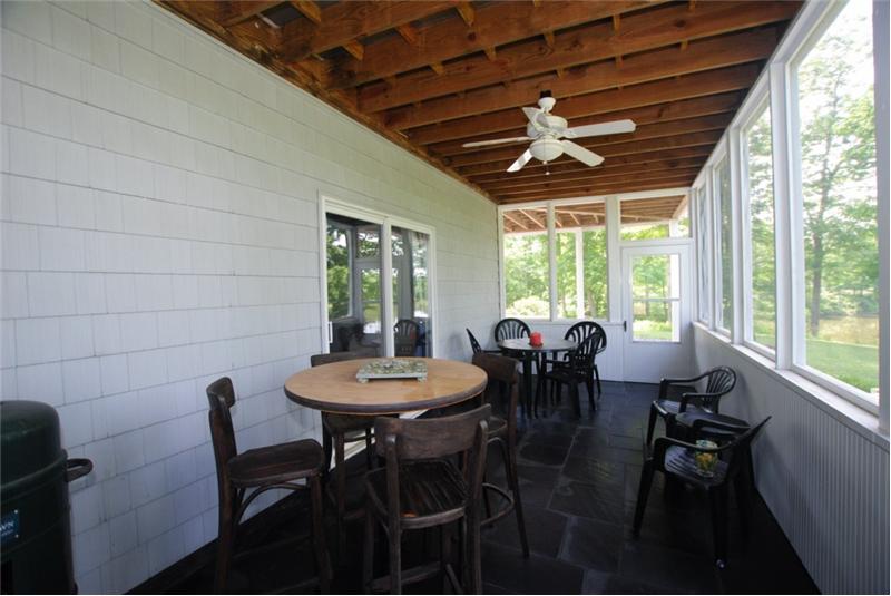 Screened porch off the billiard room
