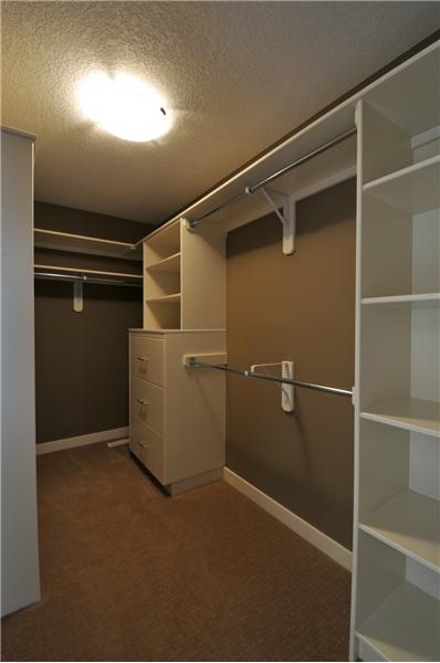 Master closet with built-in organizers.