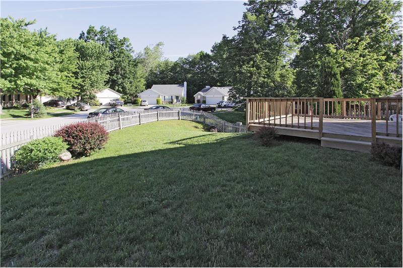 Large deck and back yard is fenced.