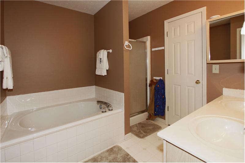 Bath w/garden tub, seperate shower and double sinks.