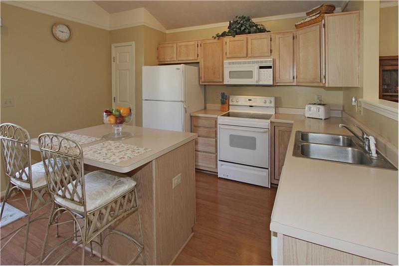 Kitchen w/center island and pantry.