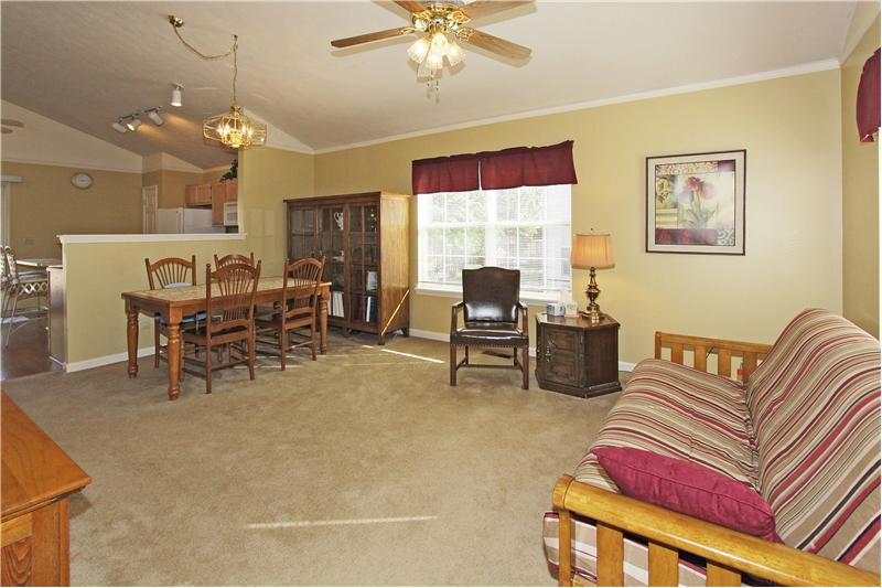 Large living room w/vaulted ceiling for more open feeling.