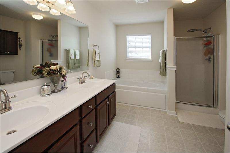 Master bath, double sinks, shower and garden tub.  California style walk-in closet.