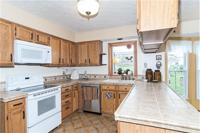 Kitchen is open to breakfast area and family room.