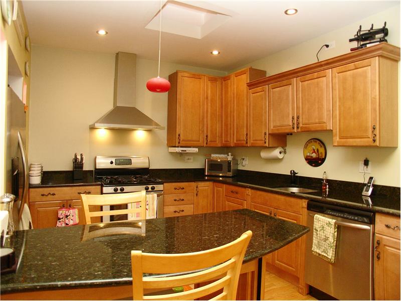 Maple Cabinets With Granate  