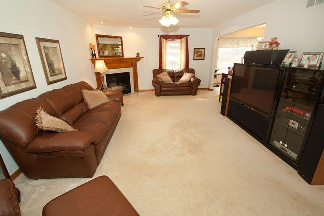 Large Living Room with WW carpet and Gas Fireplace