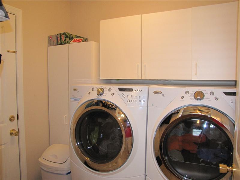 Main floor Laundry with built-in cabinets