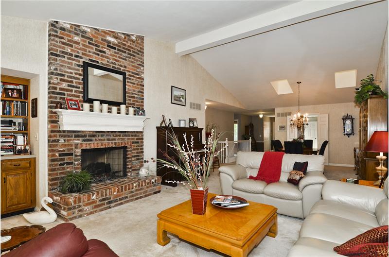 Great Room, Vaulted ceiling, fireplace, open staircase to the Lower Level