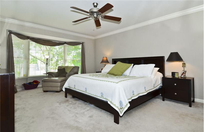Master Bedroom Suite with Bay window, ceiling fan, crown moulding