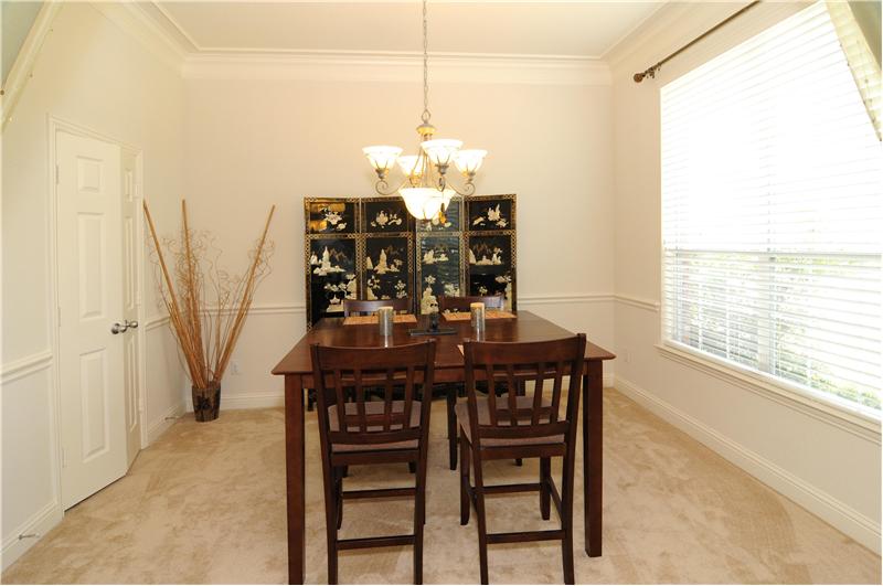 Entertain guests in the formal dining room.