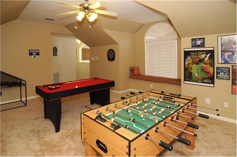 This large gameroom is located upstairs.