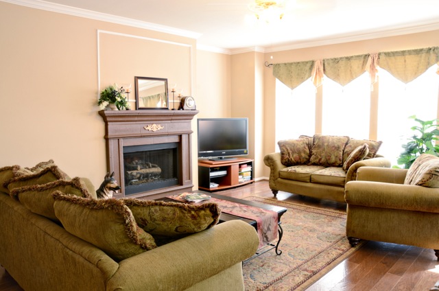 Cozy up by the fireplace in the living area open to the kitchen.