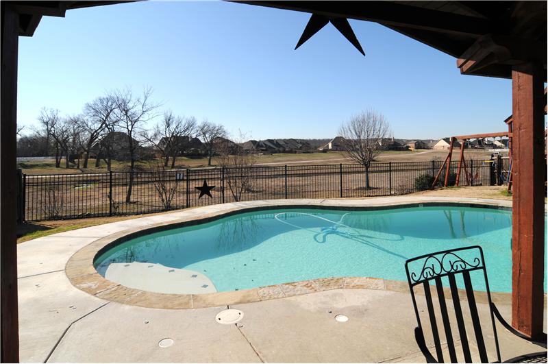 Saltwater pool in the back offers some great views from the home!