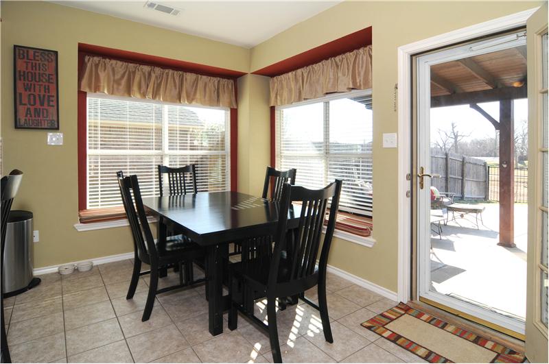 Breakfast in cozy nook with views will brighten your mornings!
