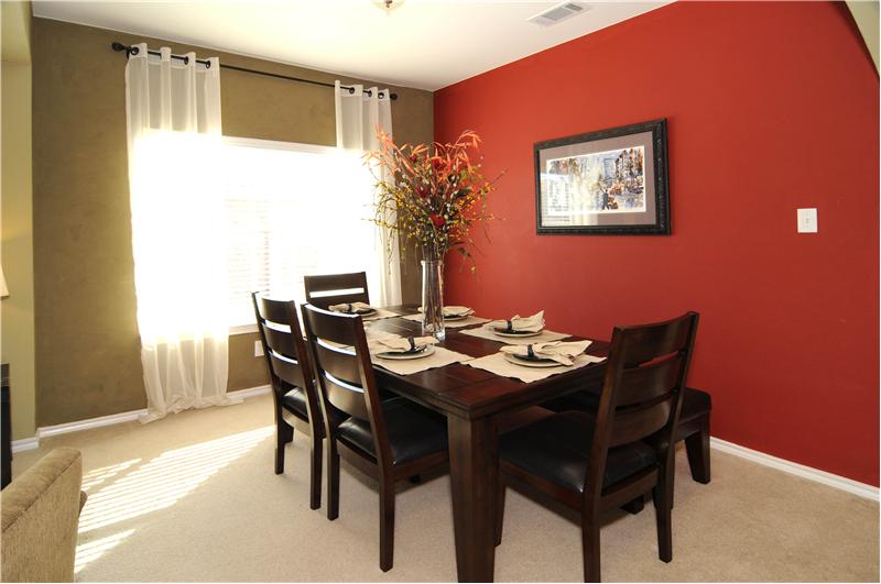 The formal dining room offers plenty of natural light.