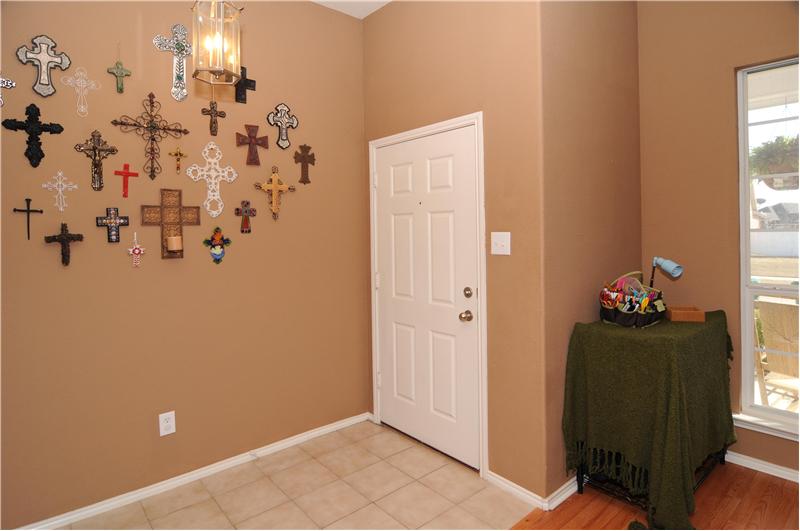 The entryway leads into the home with an open floor plan.