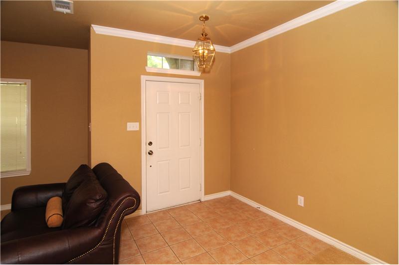 Entry way with neutral paint colors throughout the home