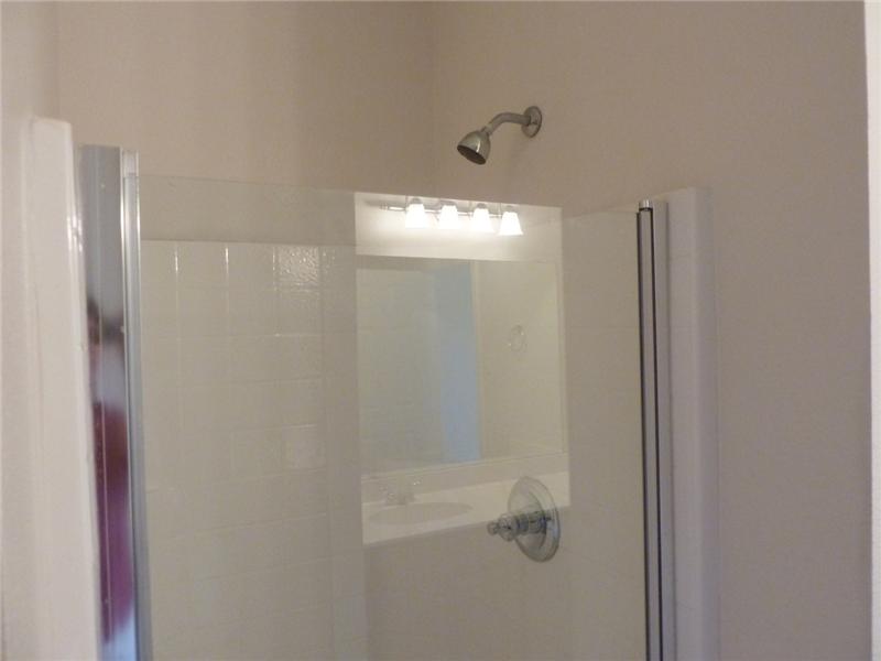 Separate shower in the master suite.