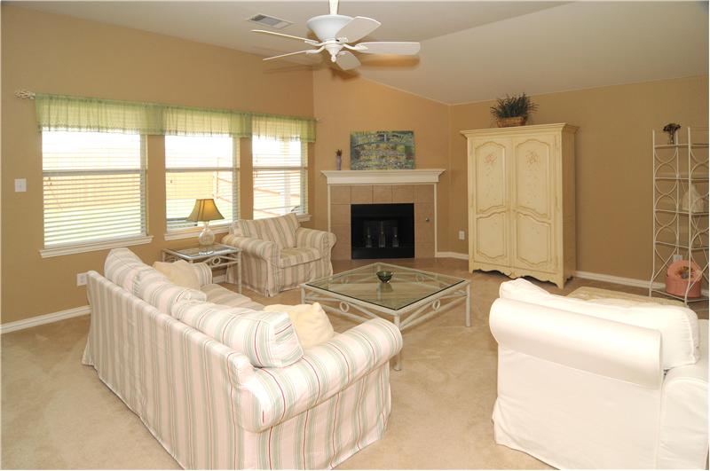 The open living room has lots of natural light.