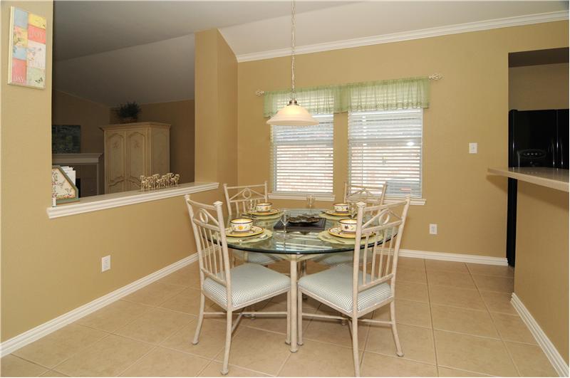 The dining room is located just off the kitchen.