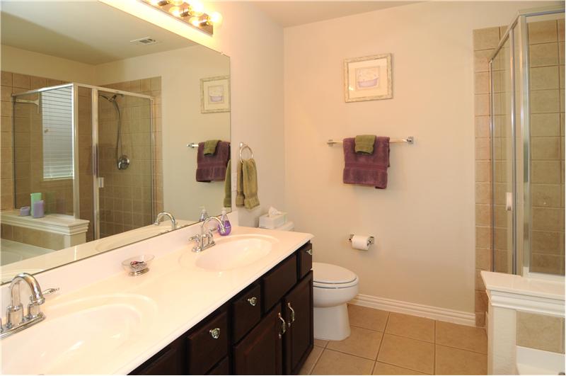 The master bath has a separate shower and garden tub.