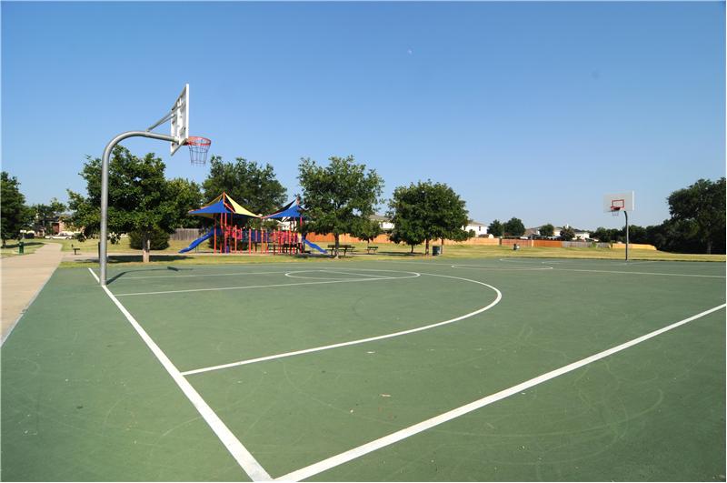 Enjoy basketball or other sports in the River Oaks Park