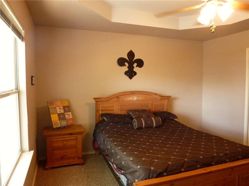 Master bedroom has a stunning ceiling!