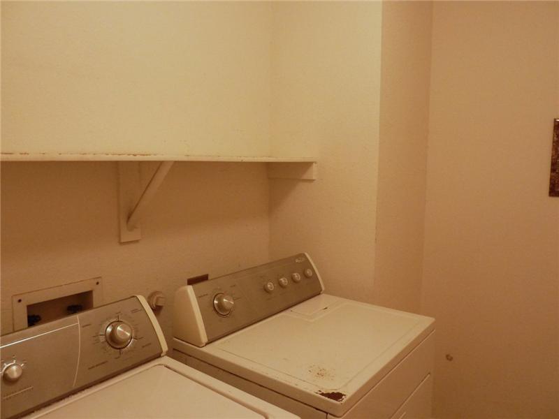 A separate laundry area is perfect for a washer & dryer.